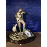 20th cent. Heredities: Shepherd, sheep dog and lamb, figurine on treen stand, signed P. Parsons