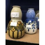 Royal Doulton: Lambeth blue/cream gourd vase, No 8006 and a cream ground vase, decorated with