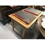Early 20th cent. Scrubbed pine plank top kitchen table. 55ins. x 30ins. x 32ins.