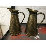 Early 20th cent. Brassware: Joseph Sankey art nouveau brass water jugs - a pair. J.S and S to