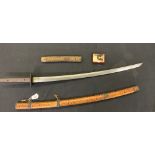 Japanese sword blade mounted as a tachi, blade of koshi zori, shinogi tsukuri form