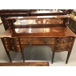 19th cent. Mahogany chiffonier, serpentine side drawers, brass lions head handles with mirrored