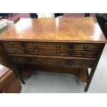 20th cent. Mahogany collector's chest of nine drawers.