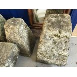 Stonework: Limestone saddle stone bases. One at 25ins. One at 28ins in height. A pair.