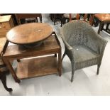 Art Deco: Oak two tier serving trolley on squared supports and brass and rubber castors. 23ins high.