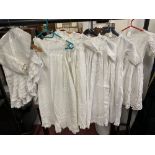 Early 20th cent. Textiles: Baby clothes, white cotton dress, openwork embroidery, fitted waist,