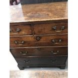 18th cent. Oak chest of two short and three long drawers on bracket supports.