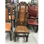 Late 17th/early 18th cent. Walnut high back hall chair with rattan seat and base.