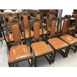 Early 20th cent. Oak, Gothic revival dining chairs, tan rexine back panels and seats x 8.