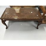 20th cent. Asian hardwood coffee table with brass inlay and glass top. 42ins. x 22ins. x 18ins.