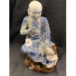 Chinese: Large 19th cent. Japanese, possible Hirado sculpted porcelain figure of a Buddhist monk