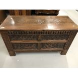 19th cent. Carolean style oak coffer with carved panels and later restoration.