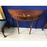 George III style mahogany demi-lune side table on tapering supports. 35ins.