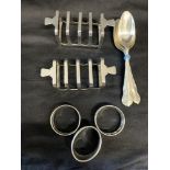 Hallmarked Silver: Mappin & Webb toast racks - a pair, and three napkin rings, plus a set of