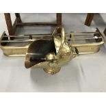Late 19th/early 20th cent. Brass and iron fender plus helmet style coal scuttle and shovel.