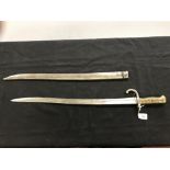 Edged Weapons: French 1872. Pattern sword bayonet and scabbard, inscribed St. Etienne 1872.