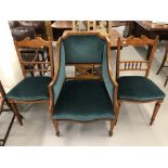 19th cent. Satinwood harlequin trio of gentleman's library armchair and two matching salon chairs on