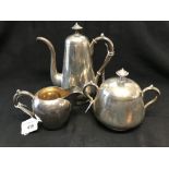 Imperial Russian Silver: Early 20th cent. Harlequin tea set comprising a teapot and sugar bowl