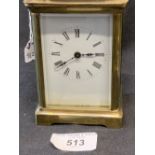 19th cent. French brass carriage clock in red Morocco case.