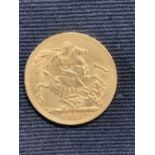 Gold Coins: 1913 George V sovereign.