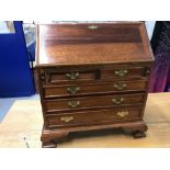 20th cent. Mahogany jeweller's bureau 2/3 graduated drawers. The drop flap opening to reveal as