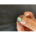 Jewellery: Opal with amethyst ring, set in yellow 9ct. gold.