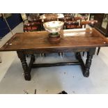 18th cent. Oak refectory table, three plank top with turned supports and heavily worn "H" stretcher.