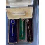 Jewellery: 19th cent. Gentleman's cravat or tie pins, yellow metal stems, with gemstone style