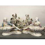 Early 20th cent. Continental hard paste figures of a reclining lady and a reclining man, crossed