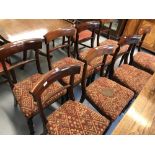 Early 19th cent. Mahogany sabre leg bar back upholstered dining chairs. (8).