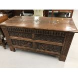19th cent. Carolean style oak coffer with carved panels and later restoration.