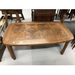 Mid 20th cent. G plan oak coffee table with tile effect top. 44ins. x 25½ins. x 17ins.