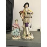 19th cent. Continental figurines of a male with a basket and walking stick (a/f). 9¾ins. Plus a