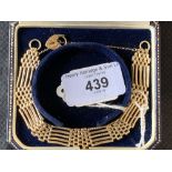 Hallmarked Gold: 9ct. Gate bracelet c1992 with blue leather box 10.6g.