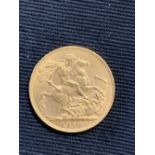 Gold Coins: 1910 Edward VII sovereign.