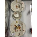 20th cent. German child's breakfast set of plate 8¼ins, bowl 8½ins, cup and saucer (handle a/f).