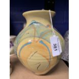 Studio Pottery: Richard Wilson baluster vase with flared rim, decorated in pastel hues. Seal mark to