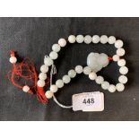 The Lady Lowry Jewellery Collection: White jade jewellery. Thirty matching beads ?ins. Dia. plus