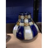 Doulton: Lambeth bulbous short neck vase decorated in blue, cream and brown panels. The neck