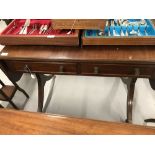 19th cent. Mahogany sofa table. Two drawers, splayed supports, end drop flaps. 37ins. 30½ins. x 21½