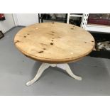 20th cent. Pine circular dining table on single support.
