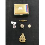 Badges: Royal Ordinance Corps, Army Service Corps, yellow metal RAF sweetheart badge, Royal