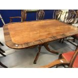 Early 19th cent. Regency rosewood inlaid rectangular tilt top table. On single column with four