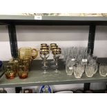 19th/20th cent. Glass: Amber lemonade set, jug and six glasses, plus gilt edged wine glass x 6,