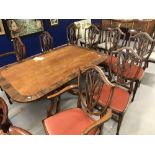 19th cent. Mahogany set of six shield back dining chairs, plus two carvers.