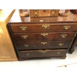 18th cent. Rustic oak chest of four drawers with brass handles and lock plates.