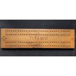 R.M.S. TITANIC - THE SAMUEL ALFRED SMITH ARCHIVE: Rare satinwood cribbage board made from wreck wood