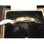 Hallmarked Gold: 9ct Fancy 3mm band, hallmarked London 1960. Weight 1.8g.