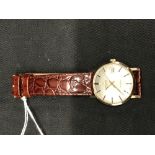 Watches: Gents 9ct. automatic Tissiot wristwatch, silver coloured dial, date at three o'clock on a