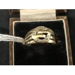 Jewellery: Yellow metal ring, fancy buckle pattern set with eight 1mm 8 cut diamonds, estimated